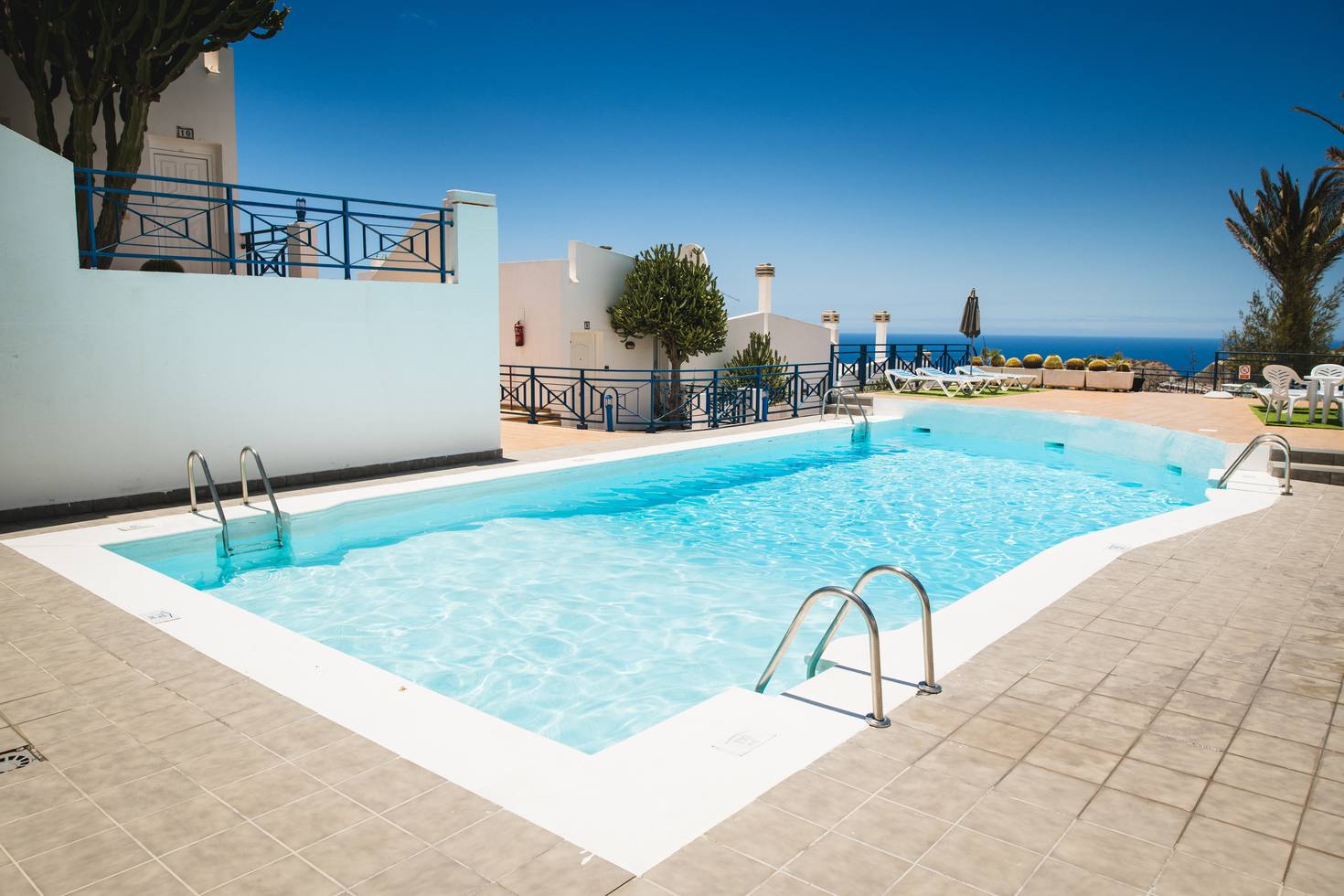 Swimming pool at the Vista Golf complex with an ocean view